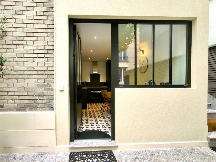 Montmartre En Rez-de-jardin Appartement *